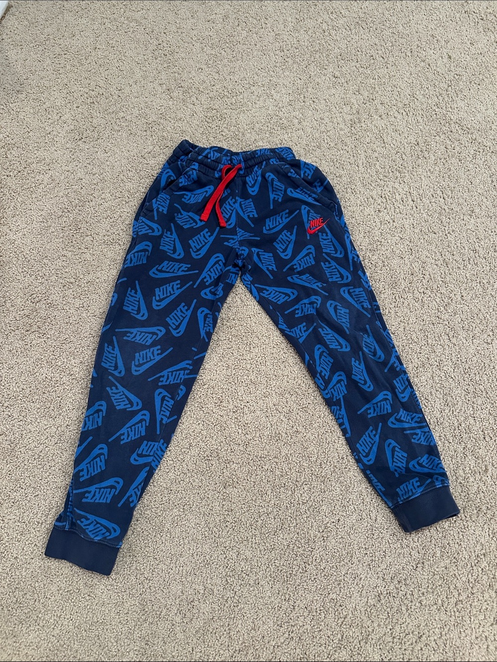 Nike Navy Jogger Pants with Blue Logo Print and Red Drawstring